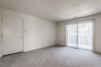 Living room with door to balcony